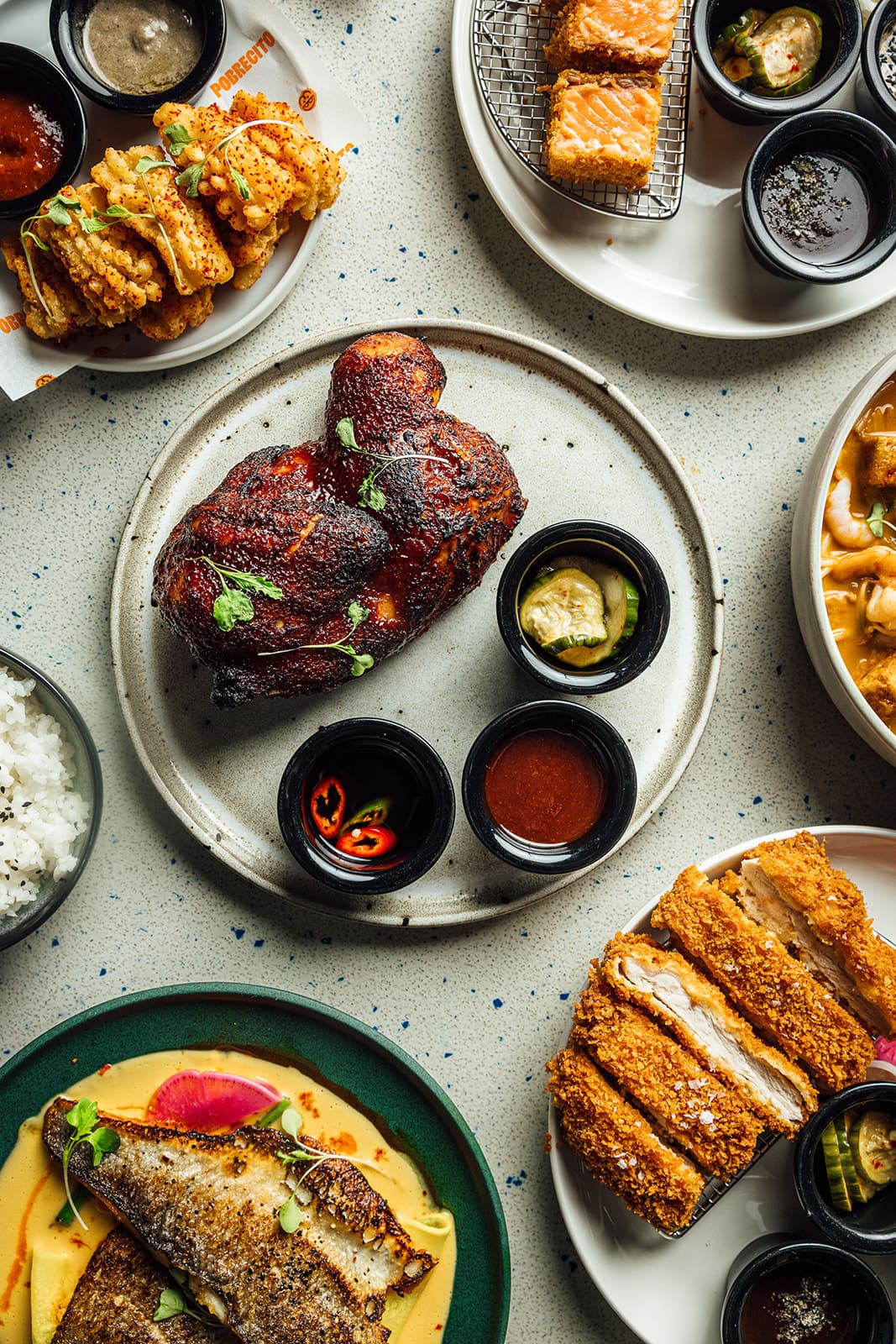 Roast chicken, salmon katsu, curry and sides from the Pobrecito menu